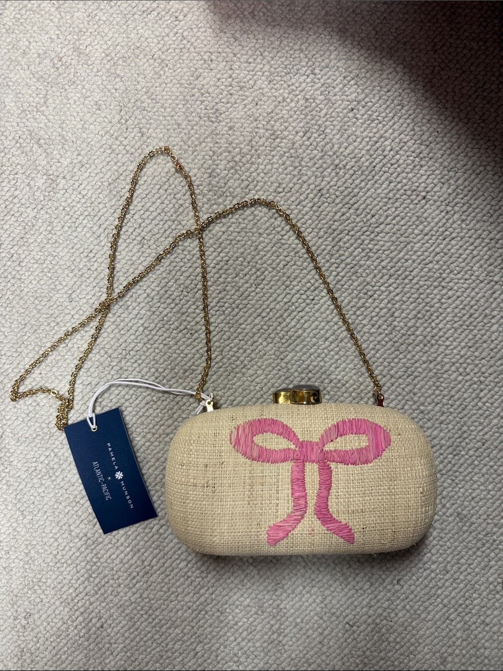 Pamela Munson x Atlantic Pacific Put a bow on it raffia clutch